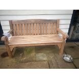 A weathered heavy duty Oxford Teak bench- 150 x 67 x 93cm