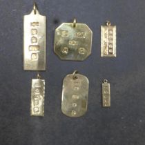 Six 9ct (hallmarked) ingot pendants, various sizes - total weight approx 40.6 grams