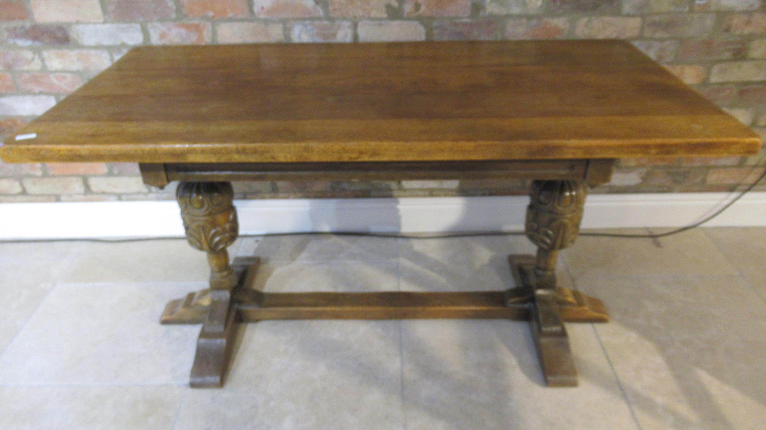 A 1940's oak dining table - 152cm x 75cm - in good condition