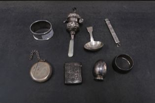 Assorted silver items including - Vesta cases, William IV caddy spoon, napkin rings, babies rattle -