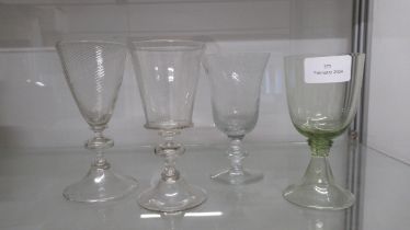 Four 18th century drinking glasses - 13.5cm x 15.5cm