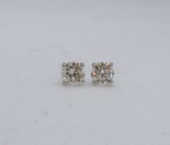 A pair of 18ct white gold solitaire diamond studs, boxed - Round Brilliant Cut diamonds 1.15ct
