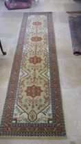 A modern woollen Royal Ottoman rug - 3m x 0.80m - in good condition