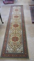 A modern woollen Royal Ottoman rug - 3m x 0.88m - in good condition