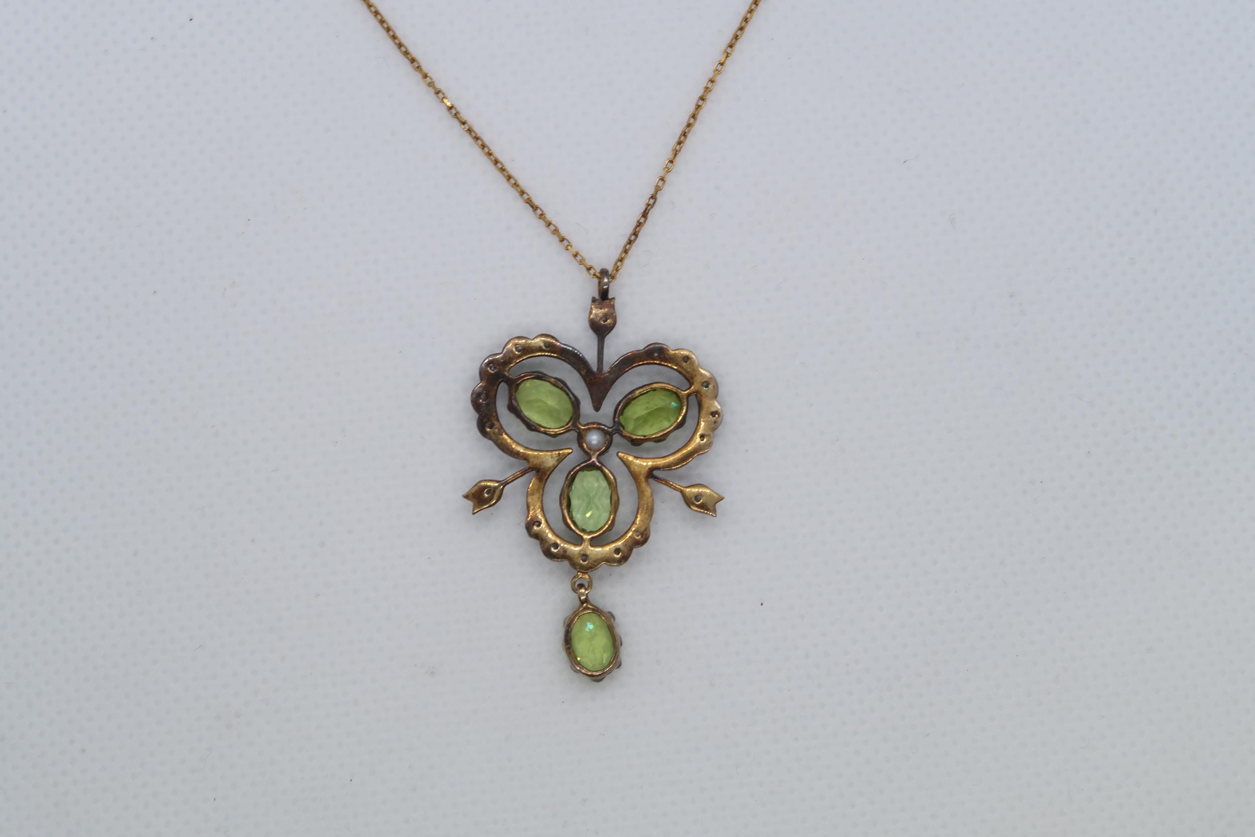 A 9ct yellow gold and silver vintage style necklace set with peridots, diamonds and a seed pearl, - Image 2 of 3