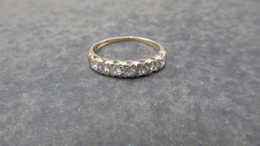 A 9ct (hallmarked) and diamond seven stone ring - band split - together with two other 9ct (