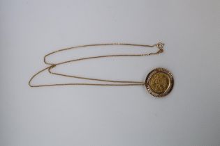 An Austro Hungarian 1915 1 Ducat gold coin mounted as a pendant in yellow gold (tested) on