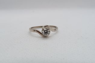 A platinum and diamond ring - diamond approx 0.5ct, colour approx G/H, clarity VS1 - ring size O