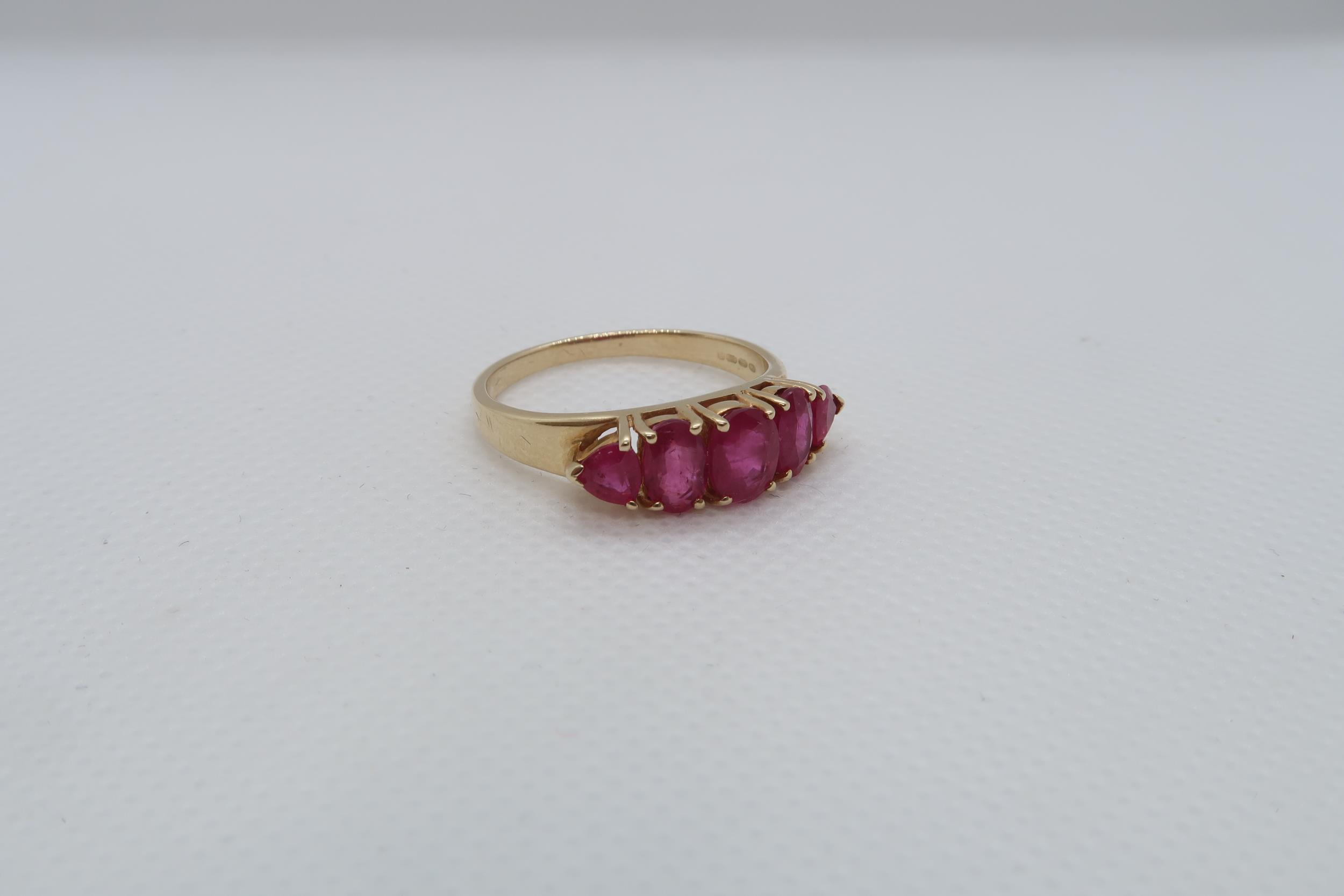 A 14ct yellow gold (hallmarked) and ruby five stone bridge ring size R/S - weight approx 3.7 grams - Image 2 of 4