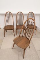 A set of four Ercol dining chairs