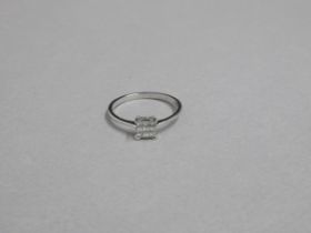 A 9ct white gold Princess cut nine stone diamond ring - head size approx 6mm x 6mm - ring size