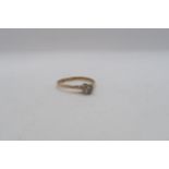 A 9ct yellow gold 0.30ct diamond ring - carat weight marked on inside of ring - ring size approx S