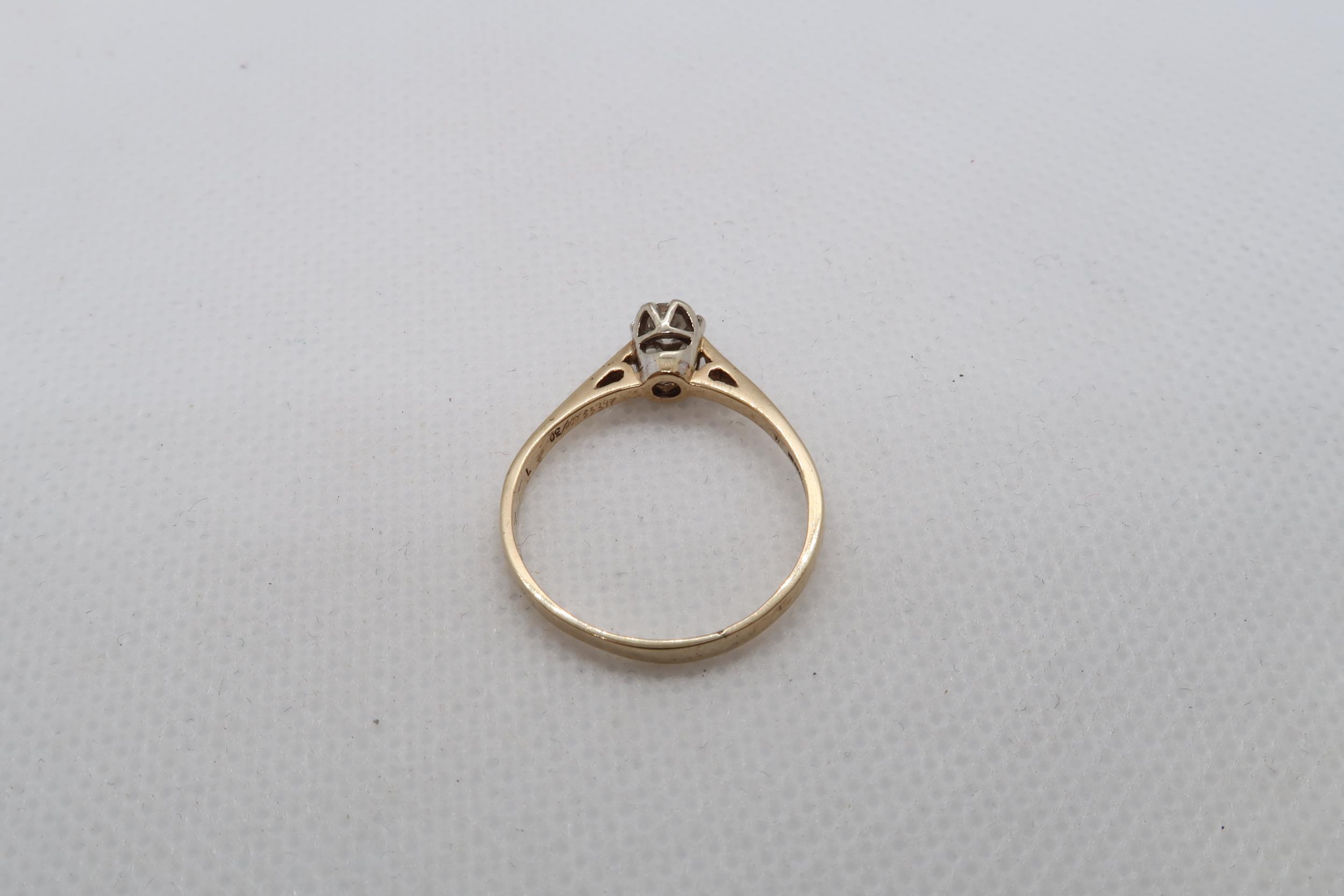 A 9ct yellow gold 0.30ct diamond ring - carat weight marked on inside of ring - ring size approx S - Image 3 of 4