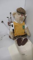 A Steiff Golfer teddy bear in bag with golf bag and clubs