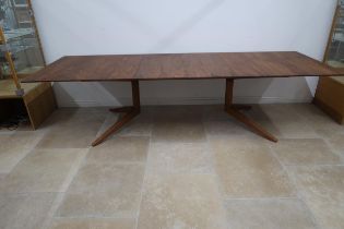 A Mathew Hilton cross extending dining table 2m x 1m x 0.75cm tall, extends to 3m with the leaves,