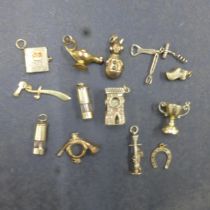 Thirteen 9ct (hallmarked) bracelet charms - approx weight 28 grams