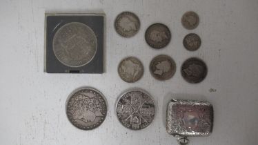 Silver coins, to include 1889 Morgan Dollar, 1887 double Florin, together with a silver vesta case -