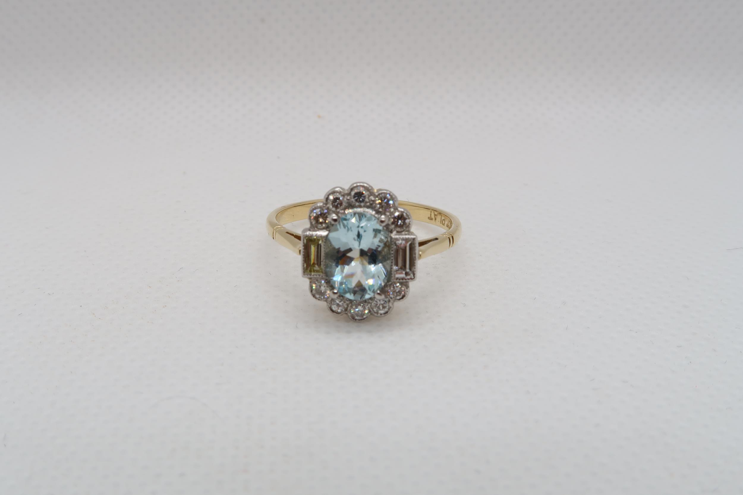 An 18ct yellow gold and platinum Art Deco style aquamarine and diamond ring - diamonds are bright