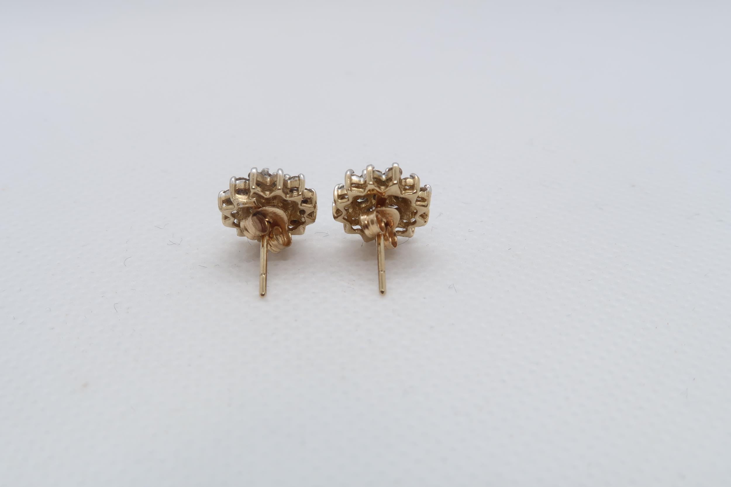 A pair of 9ct yellow gold (hallmarked) diamond cluster ear studs - approx 11mm - approx weight 2.3 - Image 3 of 3