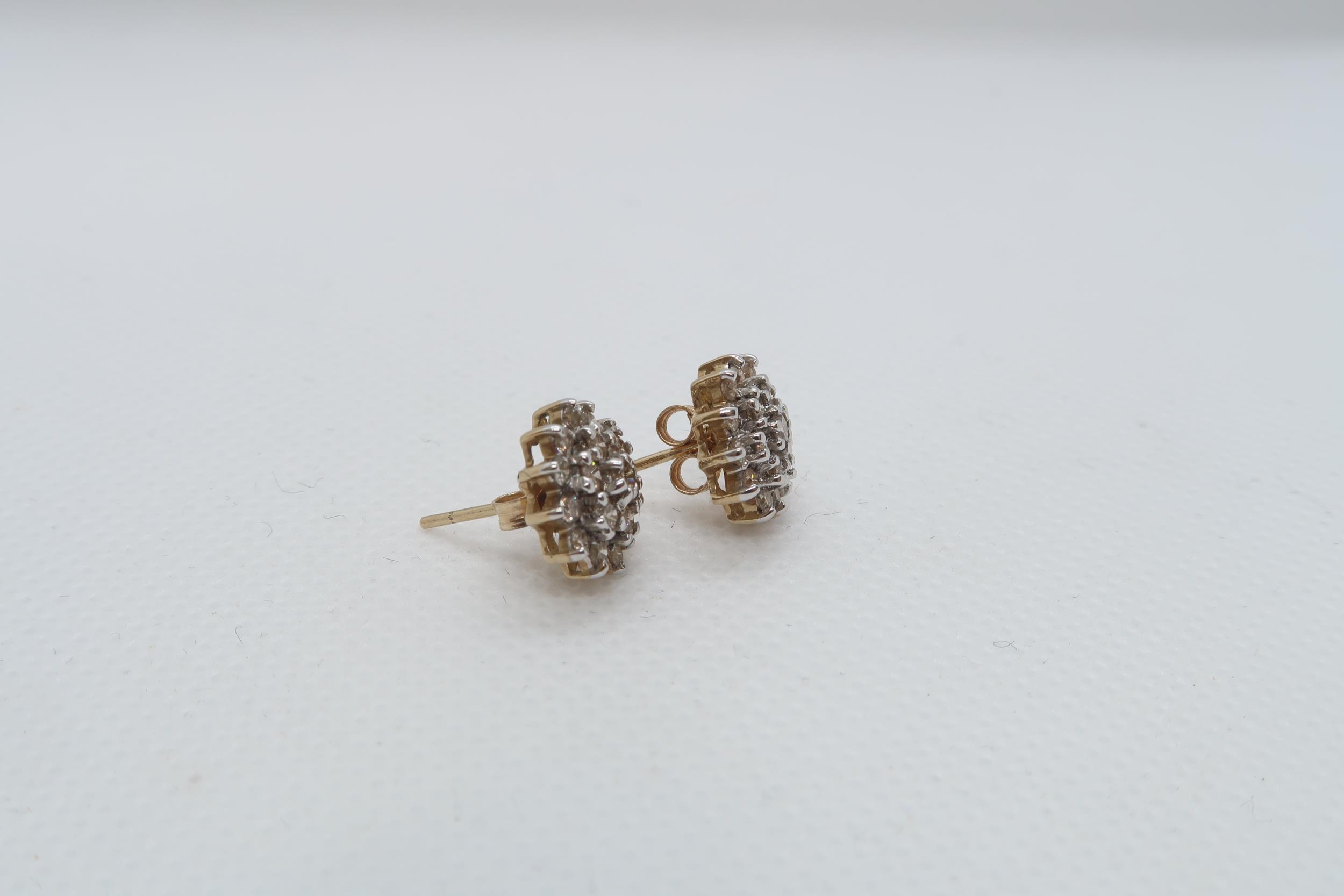 A pair of 9ct yellow gold (hallmarked) diamond cluster ear studs - approx 11mm - approx weight 2.3 - Image 2 of 3