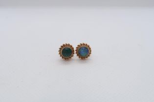 A pair of 9ct yellow gold (hallmarked) doublet opal ear studs - Diameter 1cm - weight approx 1.7