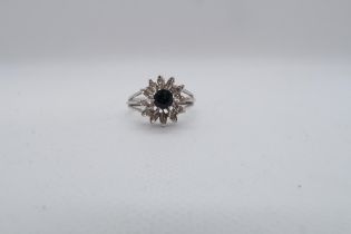 An 18ct white gold (hallmarked) sapphire and diamond flower cluster ring size L/M - weight approx