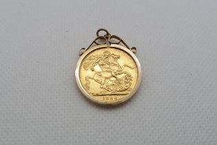 An 1896 gold sovereign set as a pendant in 9ct (hallmarked) yellow gold - approx weight 9.3 grams