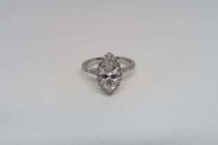 A stunning Marquise cut diamond ring set in platinum - The central Marquise cut diamond 1.07ct,