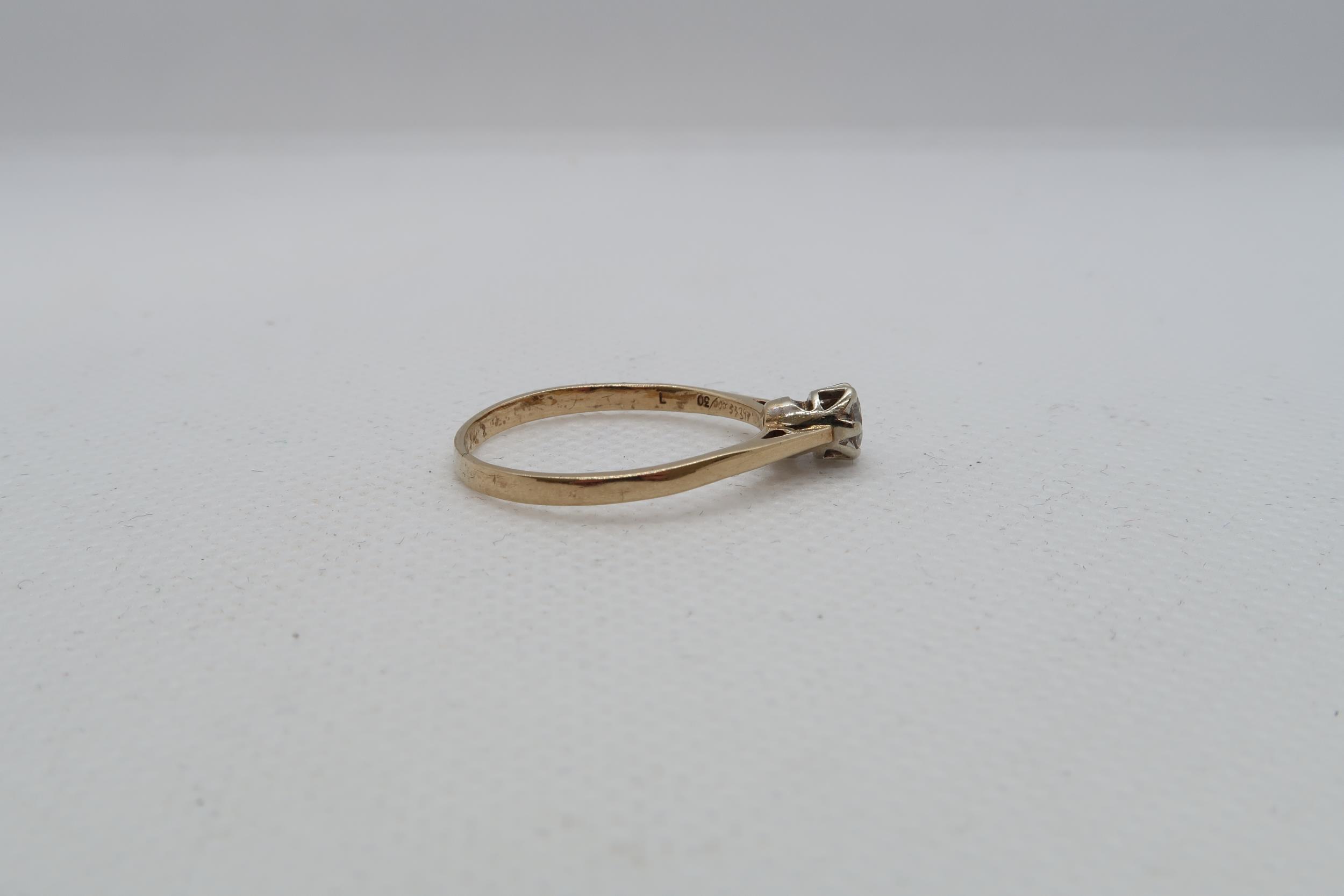 A 9ct yellow gold 0.30ct diamond ring - carat weight marked on inside of ring - ring size approx S - Image 2 of 4