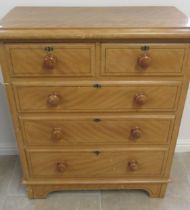 A late 19th/20th century pine five drawer chest of drawers with original knobs and keys, splits in