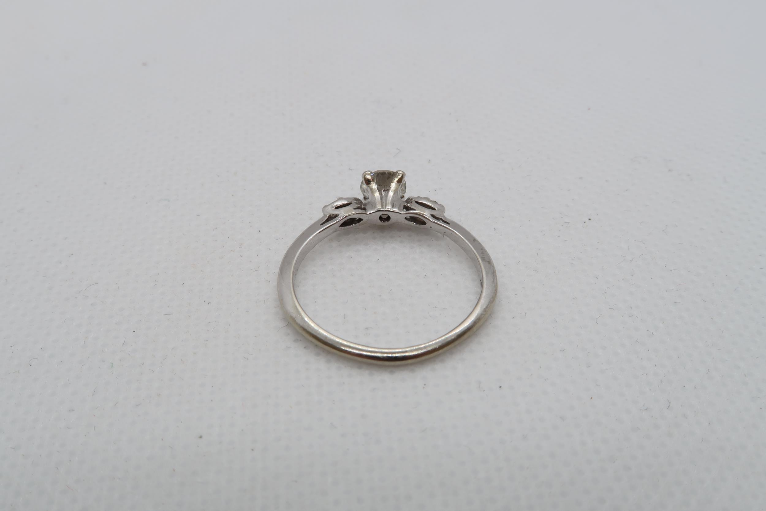 A 14ct white gold diamond ring with diamond shoulders - centre diamond approx 0.5ct - diamonds are - Image 4 of 4