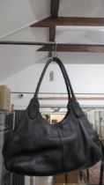 A large black Radley hand bag, approx 40cm wide x 20cm high not including handle - comes with