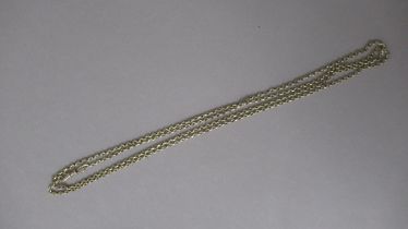 An 8ct yellow gold (tested) guard chain, 128cm with 9ct (hallmarked) clasp - approx total weight