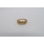An 18ct yellow gold hallmarked ring, size L, approx 4.1 grams