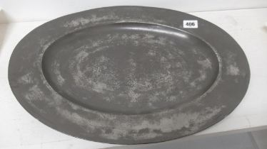 An 18th century Pewter charger - 43cm x 30cm