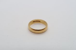 A 22ct yellow gold hallmarked band ring, size N, approx 4.6 grams