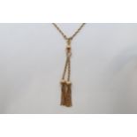 A 9ct yellow gold hallmarked chain with 9cxt yellow gold hallmarked double tassel fob, chain 50cm,