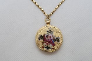 A fine hi-grade gold and enamel locket finely chased case with enamelled front opening to hinged