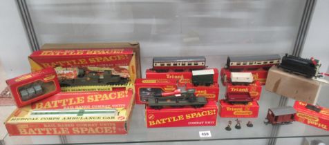 A selection of early Tri-ang models including three boxed Battle Space models, carriages, trucks etc