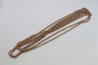 A 9ct (hallmarked) yellow gold guard chain, continuous link - approx 150cm - weight approx 28.7