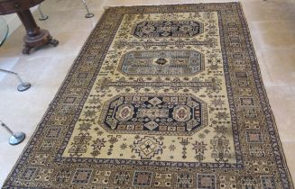 A hand knotted woollen Ardabil rug - 2.90m x 1.96m