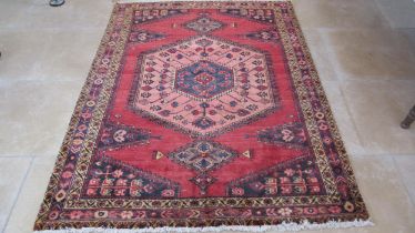 A hand knotted woollen Veis rug - 2.00m x 1.60m