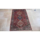 A hand knotted woollen Abadeh rug - 1.50m x 1.05m