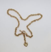 A 9ct hallmarked yellow gold watch chain style necklace with T-bar and heart charm, 52cm long,