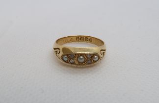 An 18ct (hallmarked) yellow gold ring with pearls and diamond accent - ring size N/O - weight approx