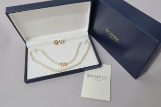 A single string of cultured pearl necklace 'Sea Magic' by Mikimoto with 14ct yellow gold (