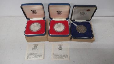 Two Royal Mint silver proof Crowns QEII Silver Jubilee together with John Pinches Edward Duke of