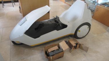 A Sinclair C5 with its original packaging - sold as seen - no key but some spares