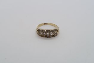 An 18ct hallmarked yellow gold diamond cluster ring set with old cut diamonds, size M, approx 4.1