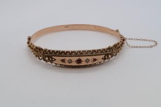 A late Victorian / Edwardian 'Etruscan' 9ct red gold hallmarked hinged bangle bracelet with diamond,